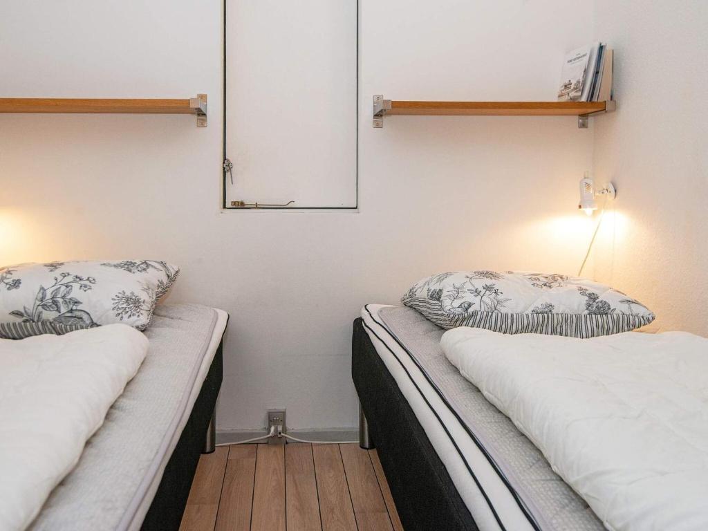Postel nebo postele na pokoji v ubytování Fanø Holiday Home Center