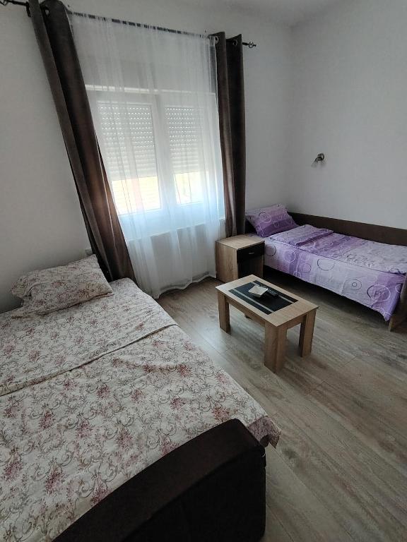 Krevet ili kreveti u jedinici u okviru objekta Apartmani Ruj