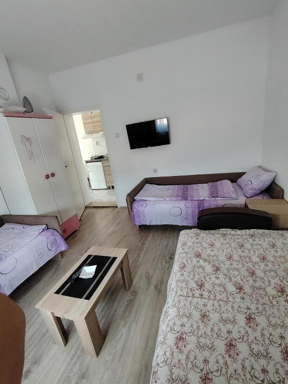 Krevet ili kreveti u jedinici u okviru objekta Apartmani Ruj