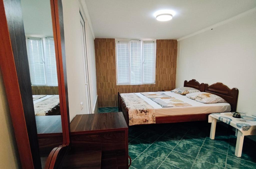 Postel nebo postele na pokoji v ubytování Guesthouse Mery