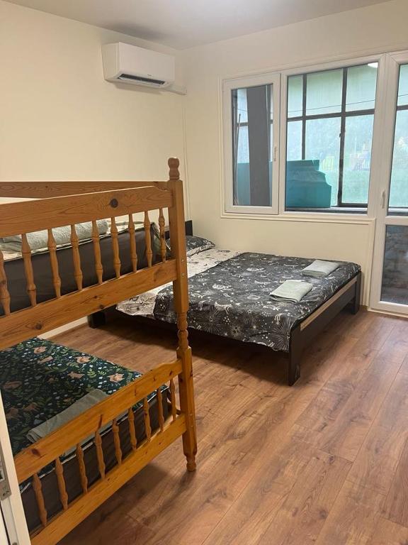 Postel nebo postele na pokoji v ubytování Mladost Vacation Apartment