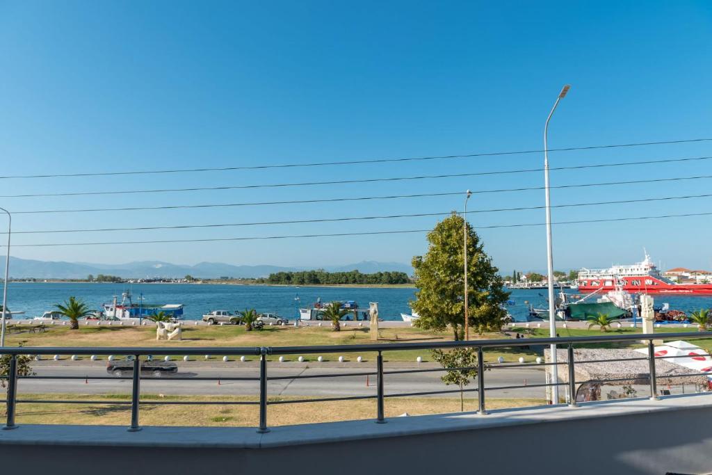 a view of the water from a balcony at Eirini luxury Apartments in Keramoti