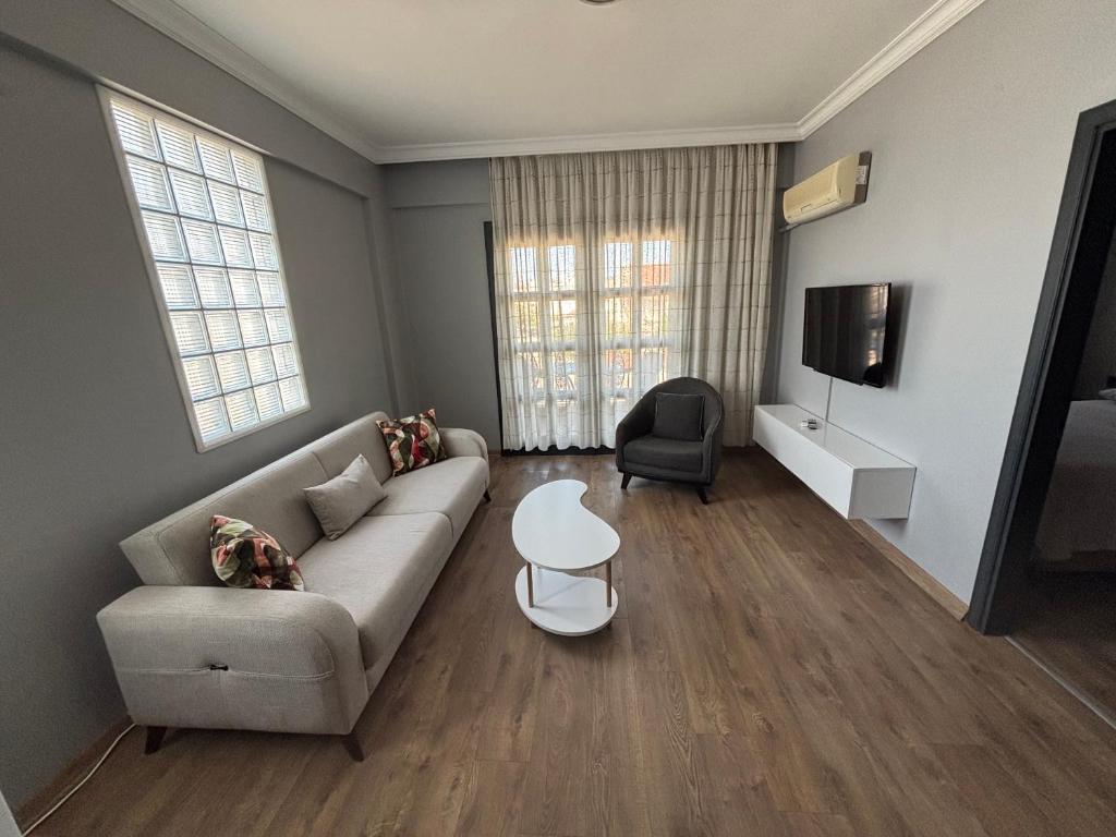 A television and/or entertainment centre at Yalcinkaya Tas Apart