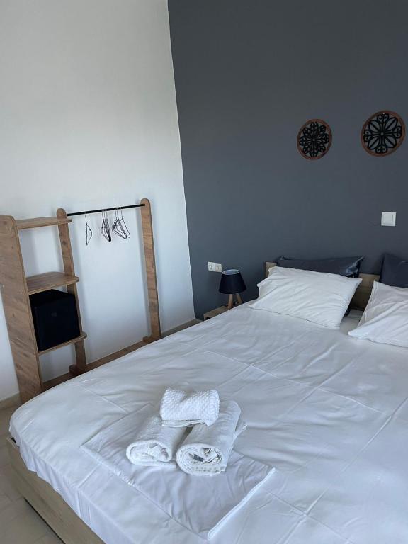 Postel nebo postele na pokoji v ubytování Vesper Rooms