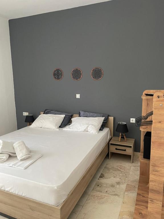 Postel nebo postele na pokoji v ubytování Vesper Rooms