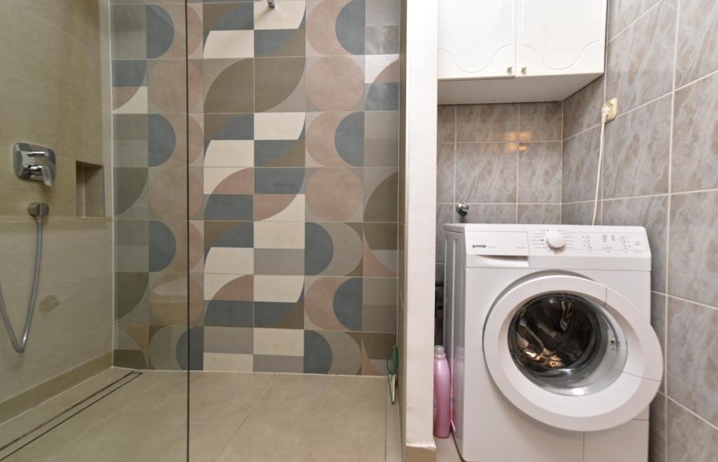 Kúpeľňa v ubytovaní Apartments 408 Fazana