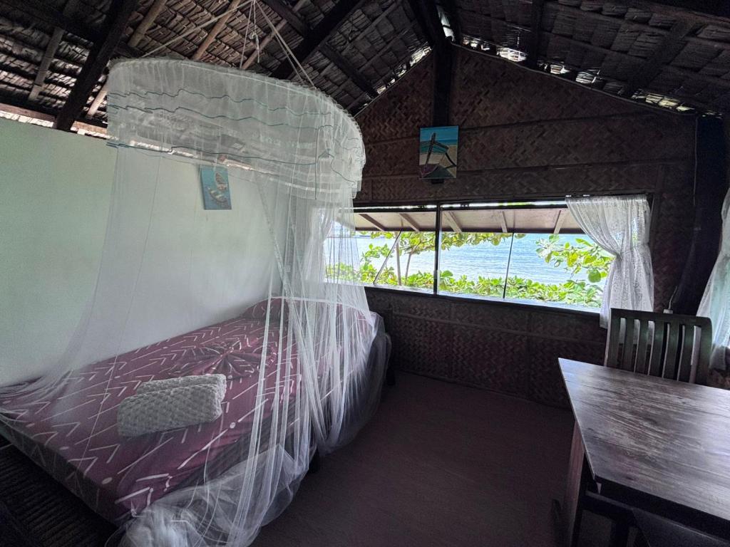 Posezení v ubytování Kusirena Homestay