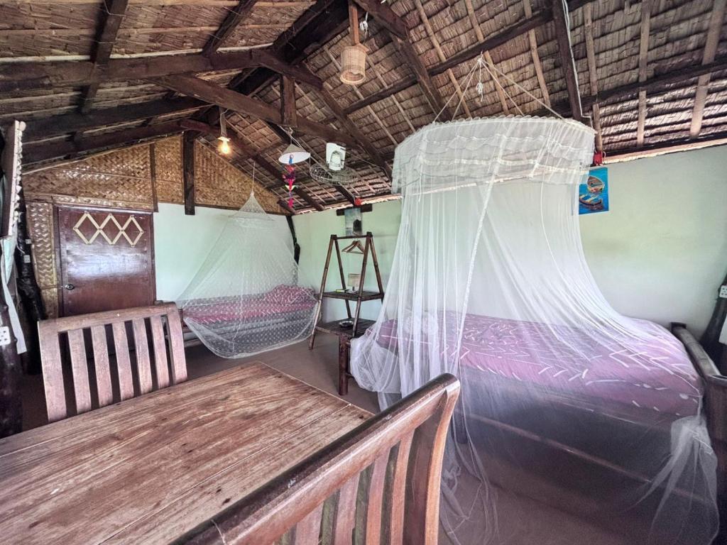 Posezení v ubytování Kusirena Homestay