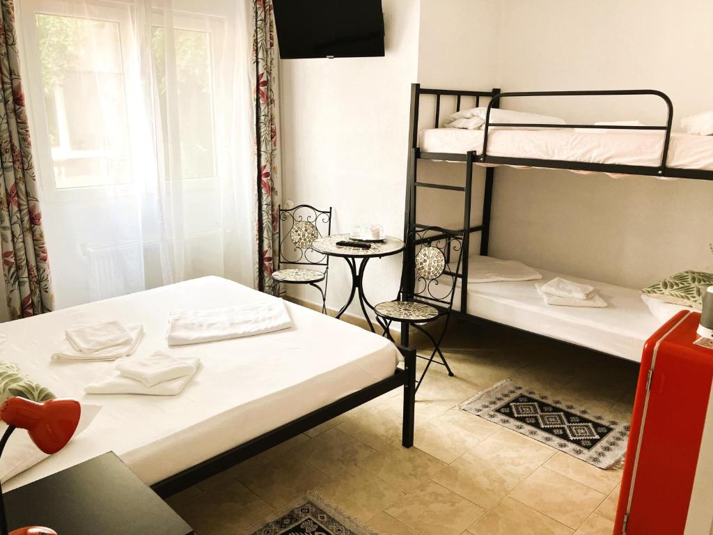 Postel nebo postele na pokoji v ubytování Taxi Hostel