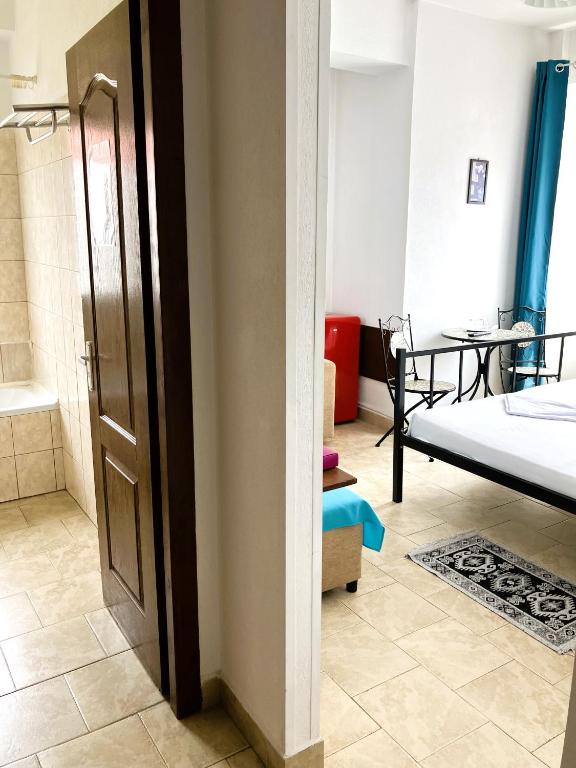 Postel nebo postele na pokoji v ubytování Taxi Hostel