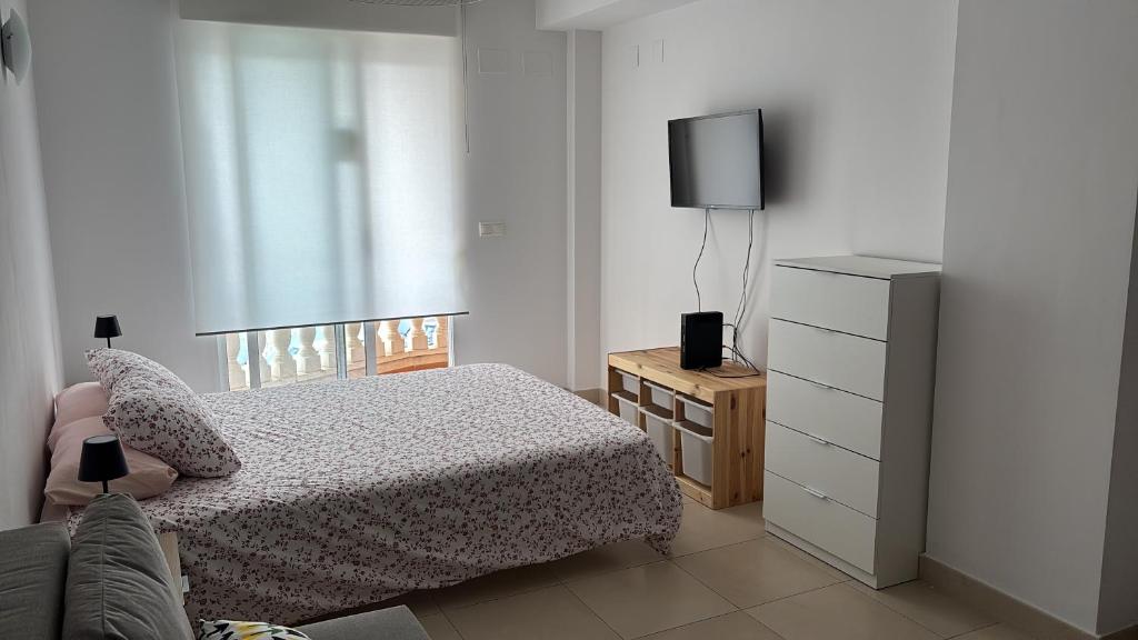 Ένα ή περισσότερα κρεβάτια σε δωμάτιο στο Beach Apartament Playa
