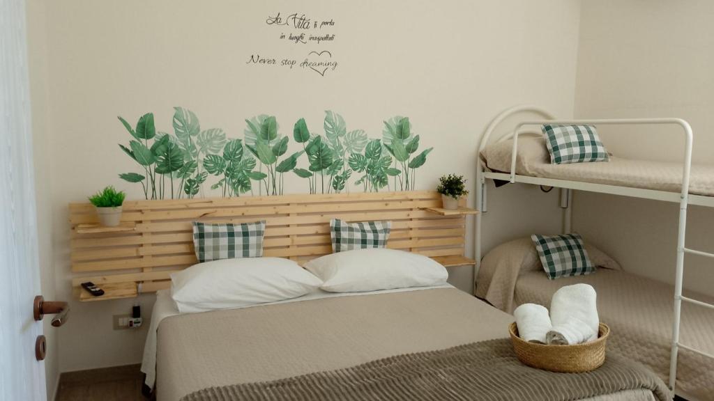 A bed or beds in a room at L'antico borgo