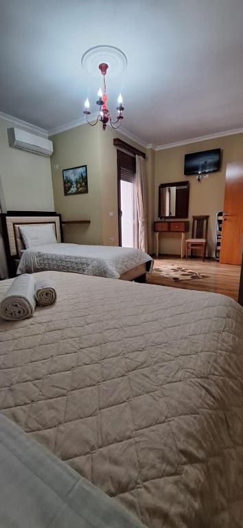 Postel nebo postele na pokoji v ubytování Hotel Theo