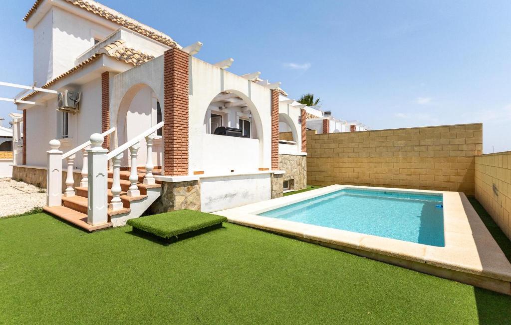 a house with a swimming pool in the yard at Awesome Home In Avileses in Avileses