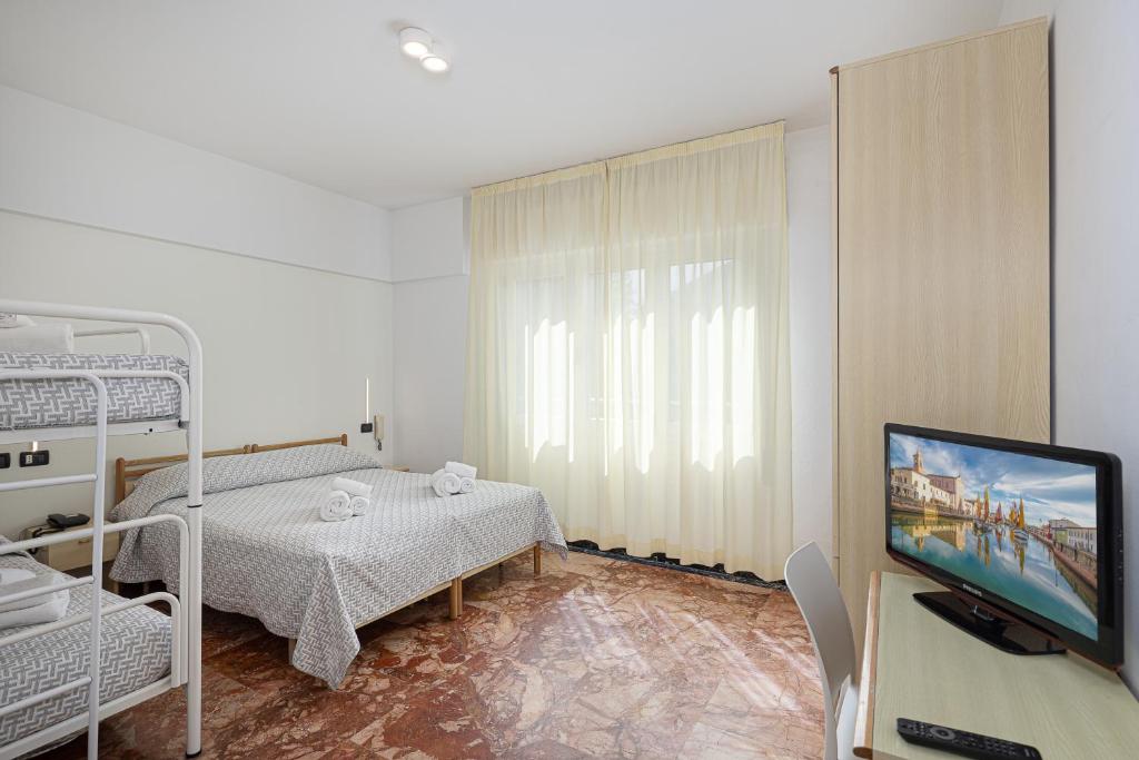 Postel nebo postele na pokoji v ubytování Hotel Altamarea Cesenatico