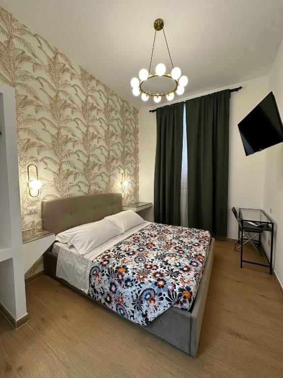 Postel nebo postele na pokoji v ubytování Hotel Lodi