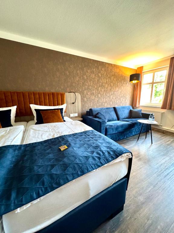 Postel nebo postele na pokoji v ubytování Hotel Am Dom