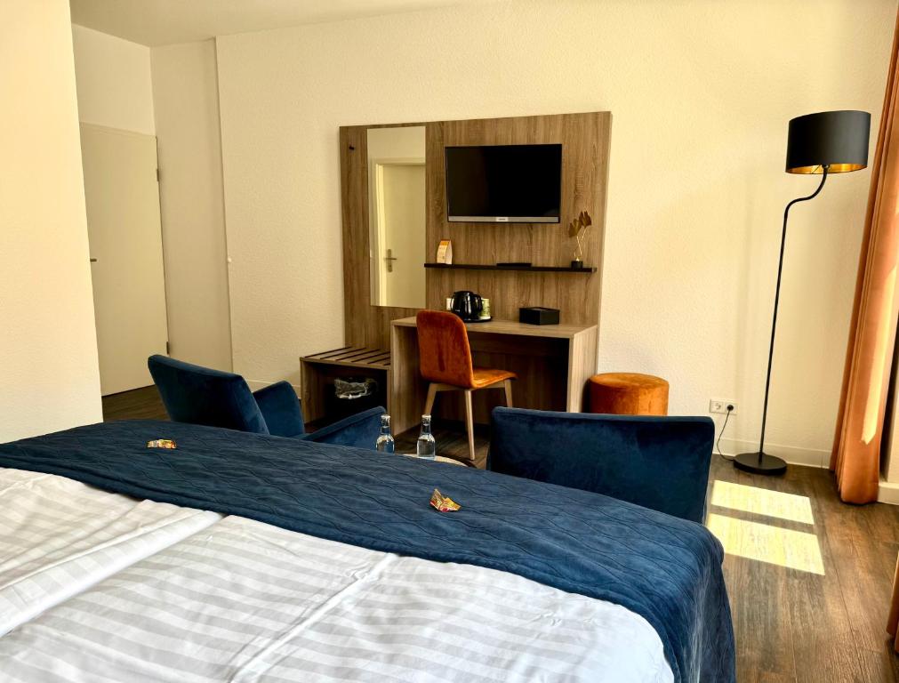 Postel nebo postele na pokoji v ubytování Hotel Am Dom