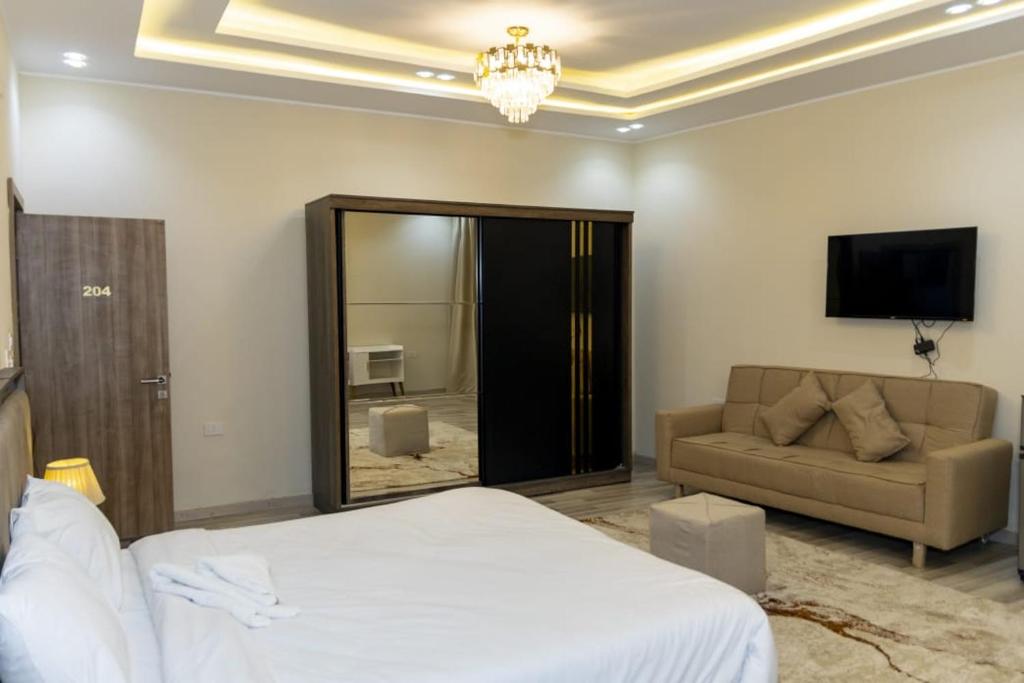 TV a/nebo společenská místnost v ubytování Maktub Pyramids Hotel