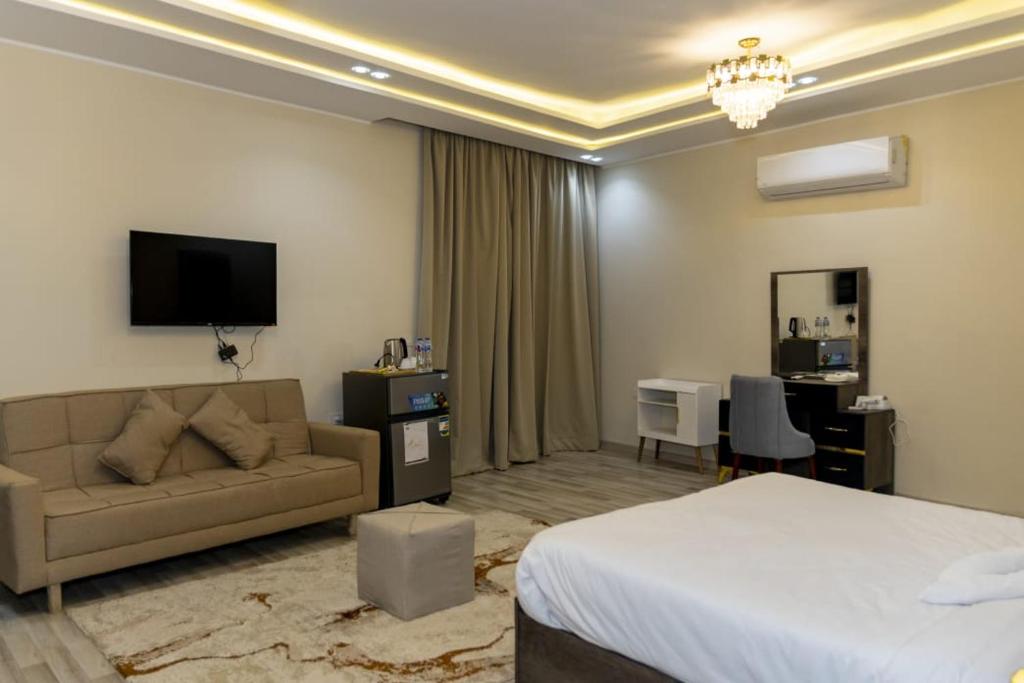 Postel nebo postele na pokoji v ubytování Maktub Pyramids Hotel