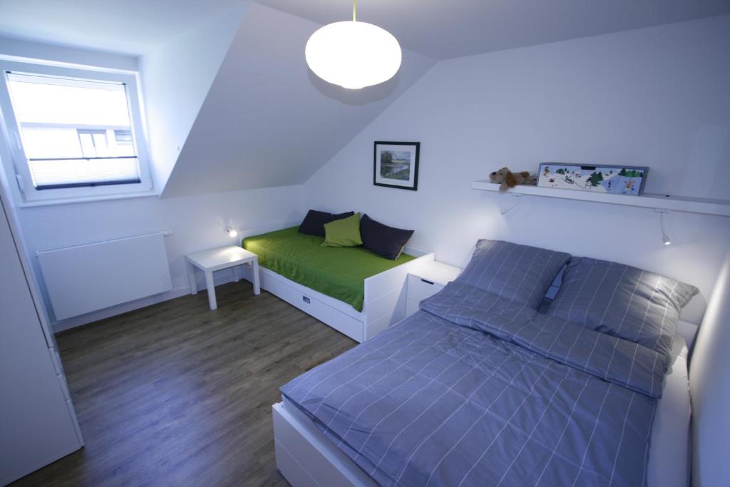 Postel nebo postele na pokoji v ubytování Haus Karla