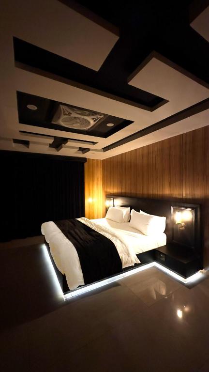 Postel nebo postele na pokoji v ubytování Starlit Hotel, Skardu