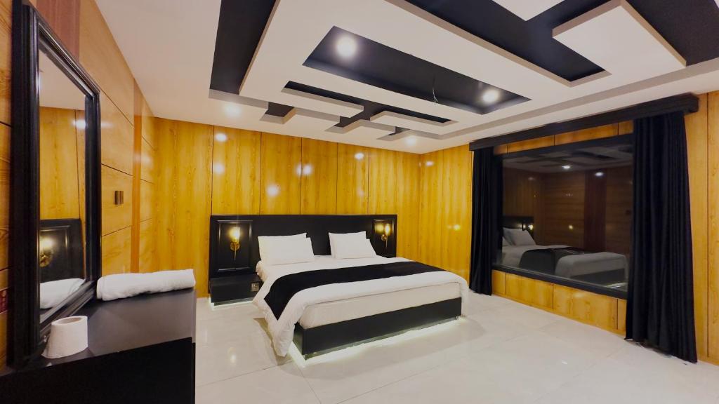 Postel nebo postele na pokoji v ubytování Starlit Hotel, Skardu