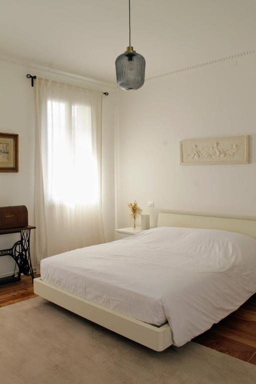 Postel nebo postele na pokoji v ubytování Casa Dimatore