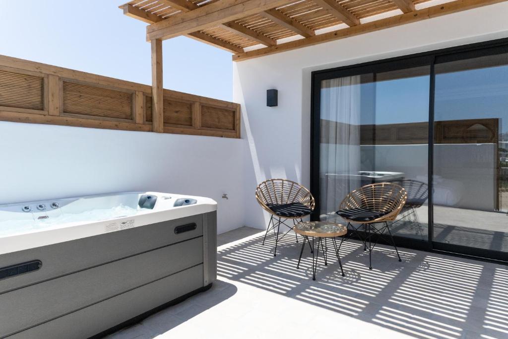 Balkón nebo terasa v ubytování Le Ciel Suites & Villas