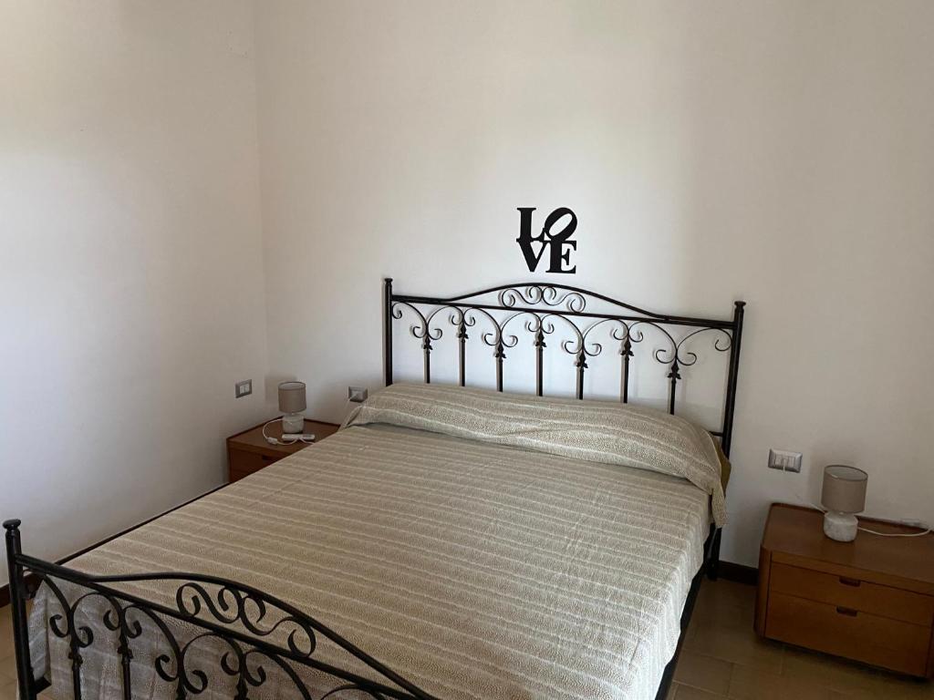 Postel nebo postele na pokoji v ubytování Residenza Rogiò