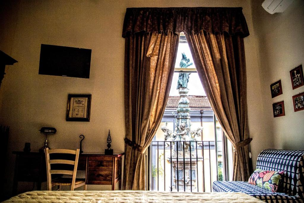 Posteľ alebo postele v izbe v ubytovaní San Gennaro B&B