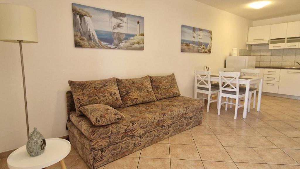 Kuchyň nebo kuchyňský kout v ubytování Apartmani Dolencic