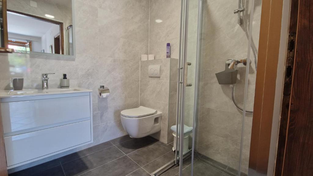 Koupelna v ubytování Apartmani Dolencic
