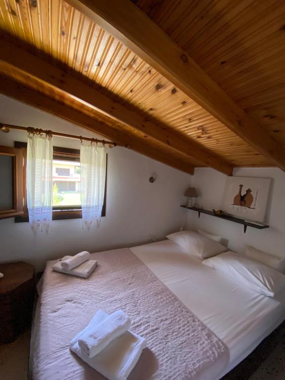 Postel nebo postele na pokoji v ubytování Minthi