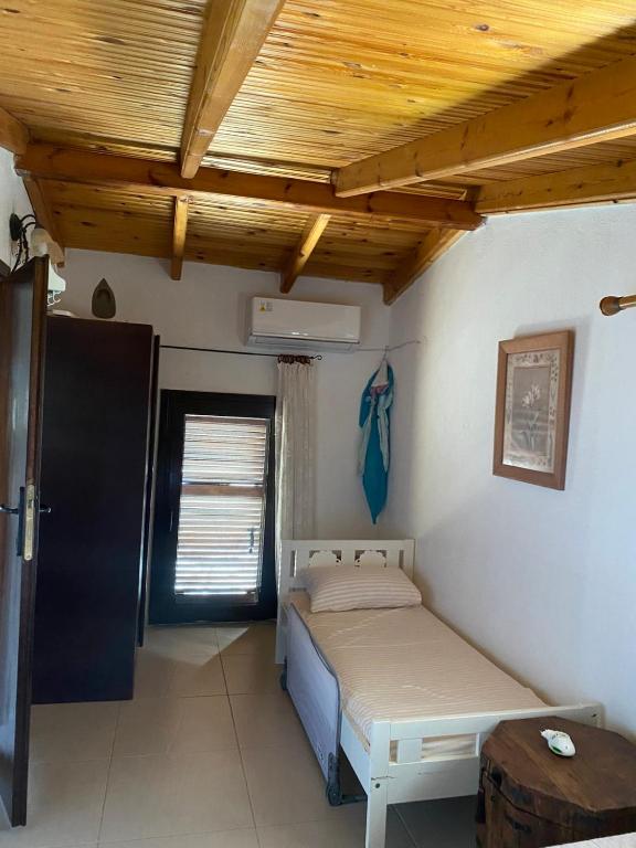 Postel nebo postele na pokoji v ubytování Minthi