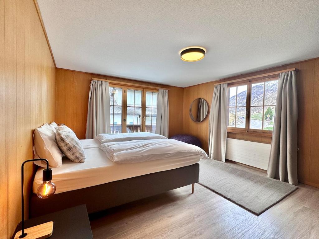 Postel nebo postele na pokoji v ubytování Chalet Gemsblick