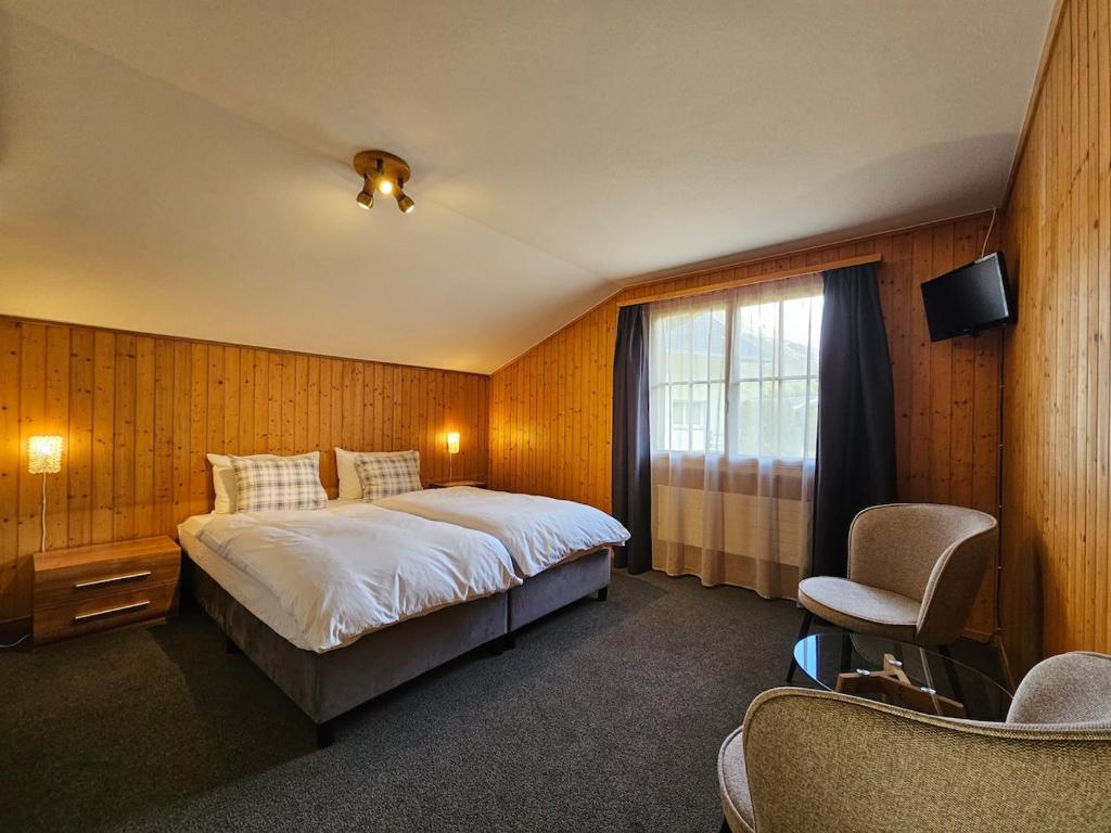 Postel nebo postele na pokoji v ubytování Chalet Gemsblick