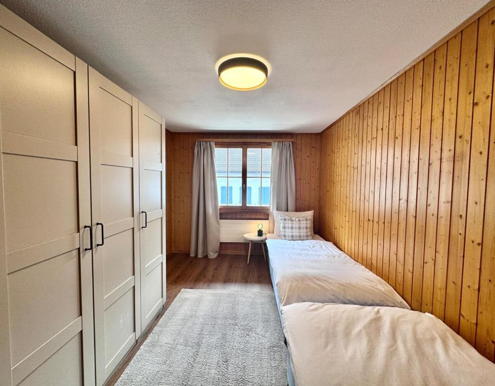 Postel nebo postele na pokoji v ubytování Chalet Gemsblick