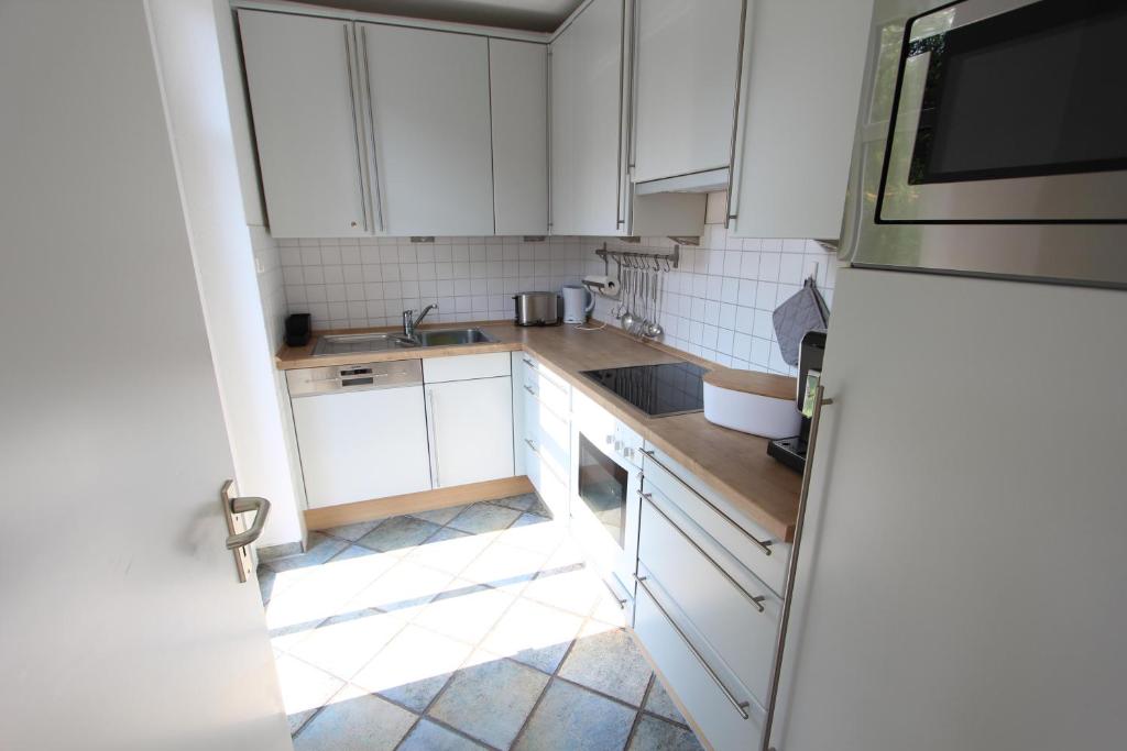 Kuchyň nebo kuchyňský kout v ubytování Residenz Südstrand
