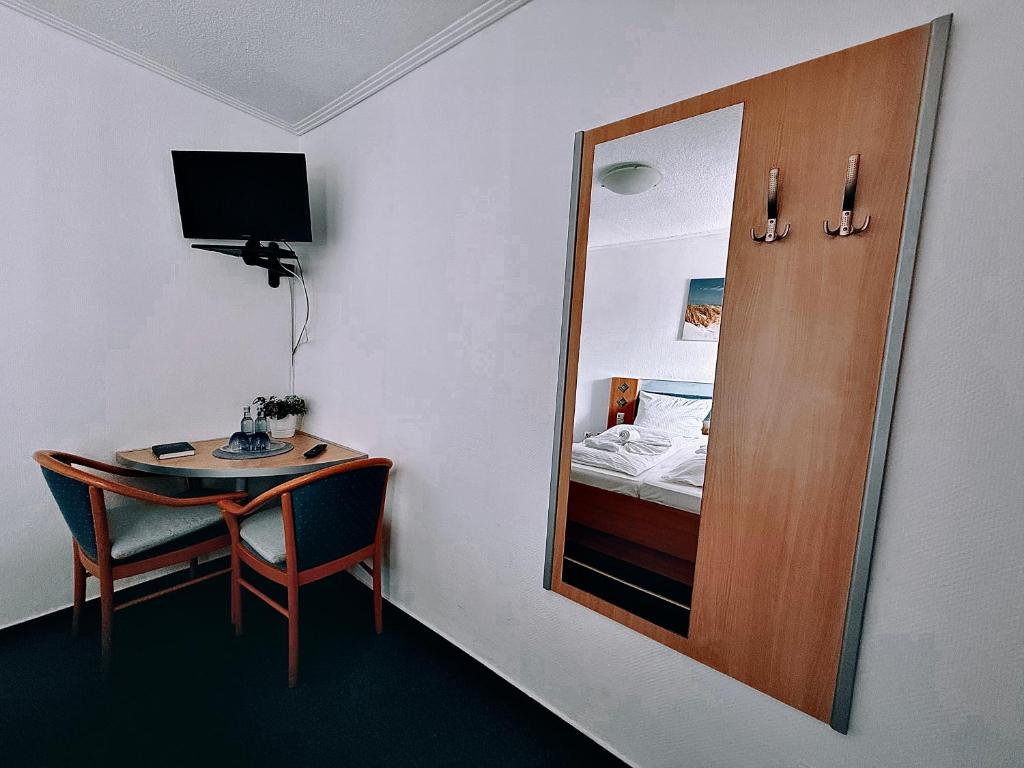 TV a/nebo společenská místnost v ubytování Hotel Granitz