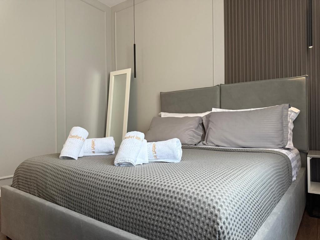 Postel nebo postele na pokoji v ubytování Comfort Inn Hotel