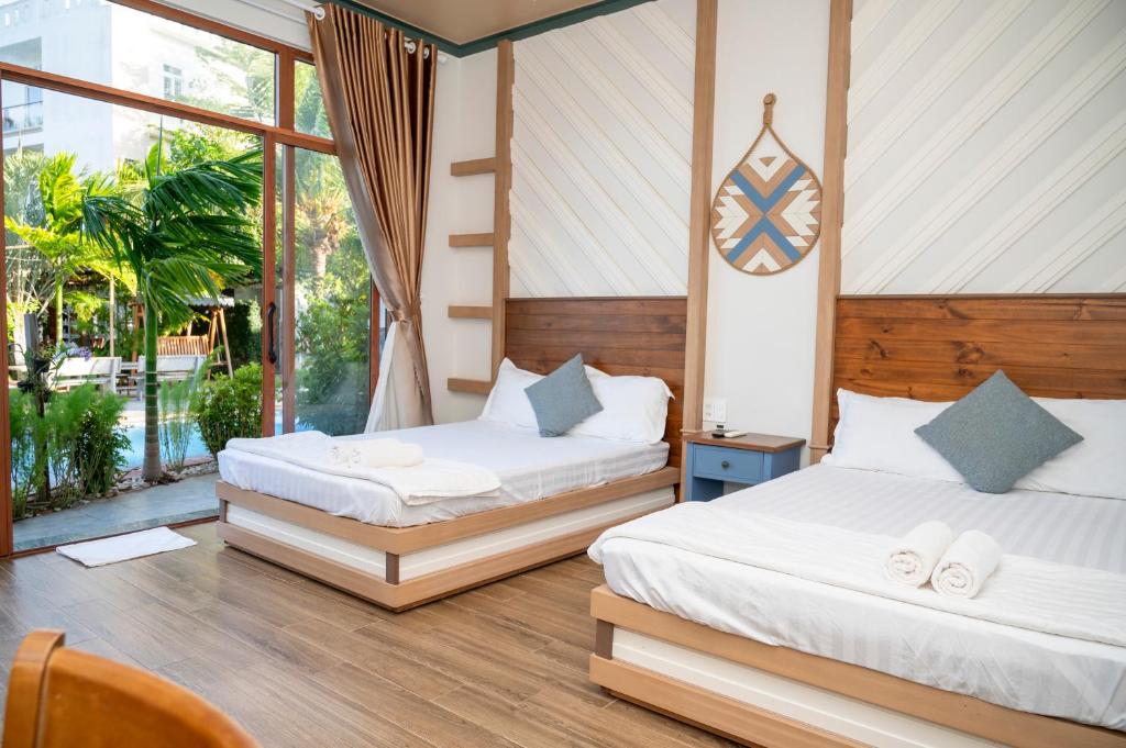 Giường trong phòng chung tại Gia An Hung Guest House
