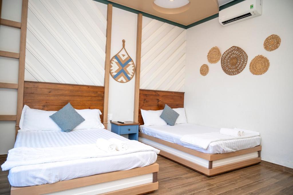 Giường trong phòng chung tại Gia An Hung Guest House