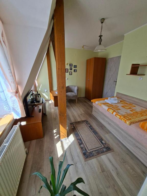 Postel nebo postele na pokoji v ubytování Hotel Alster