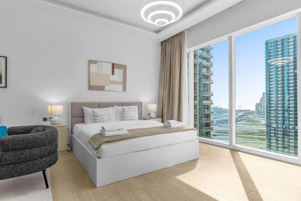Llit o llits en una habitació de Modern Studio In Jlt Cluster L Top Facilities