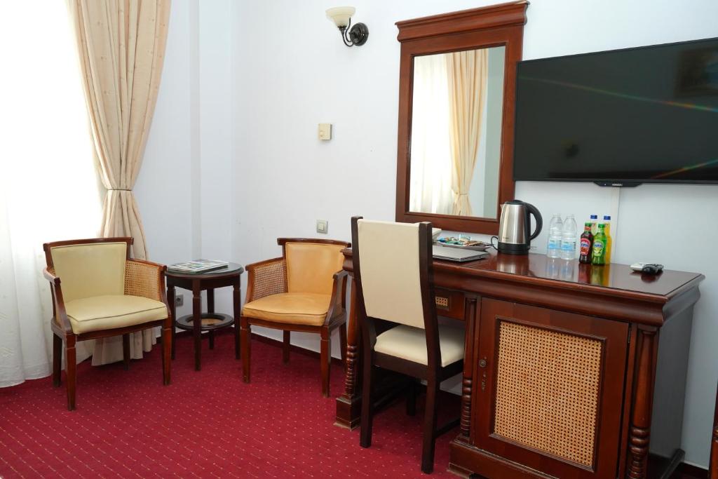 TV a/nebo společenská místnost v ubytování Hotel Bliss