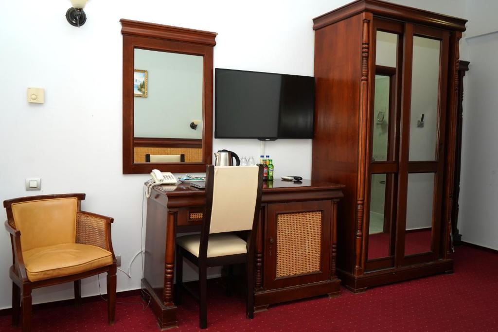 TV a/nebo společenská místnost v ubytování Hotel Bliss