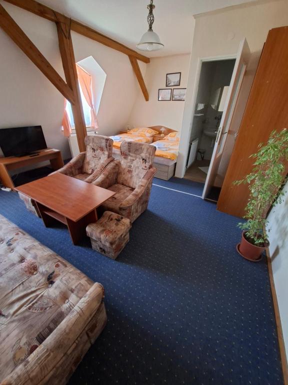 Postel nebo postele na pokoji v ubytování Hotel Alster