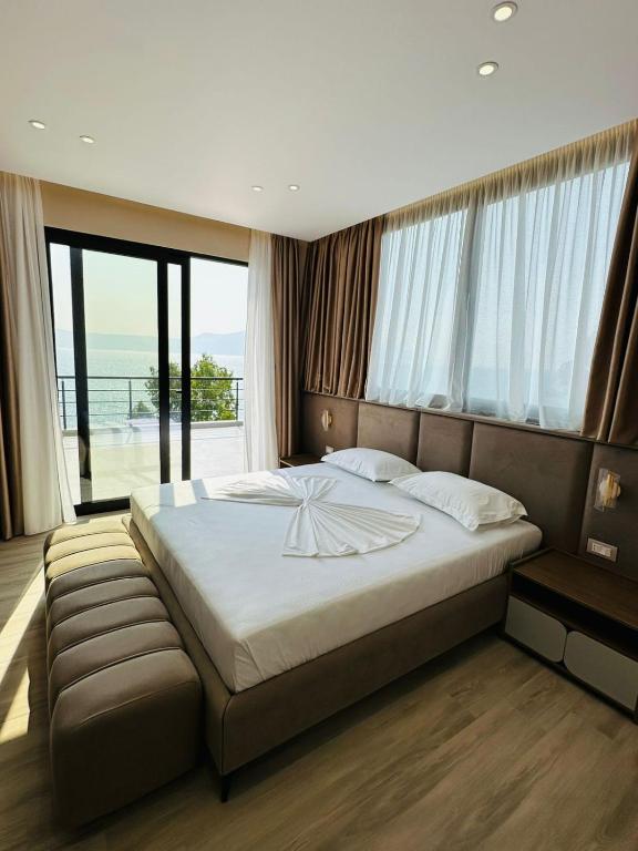 Postel nebo postele na pokoji v ubytování Hotel Roalb