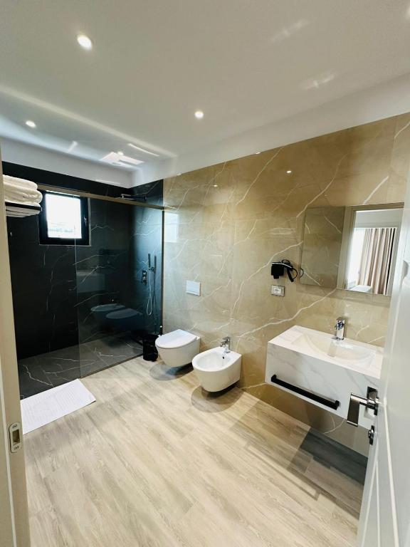 Koupelna v ubytování Hotel Roalb